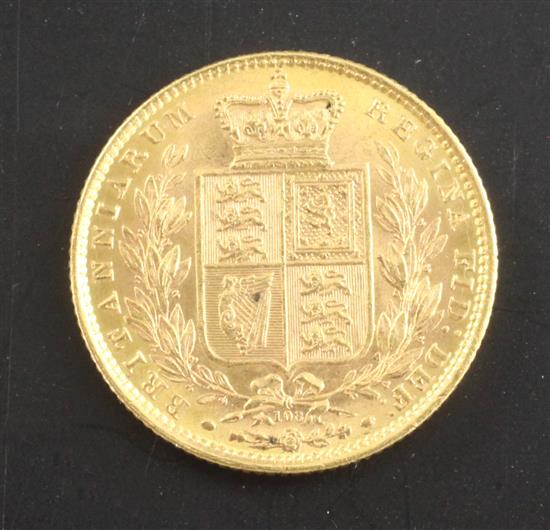 An 1872 Victoria gold sovereign, near UNC.